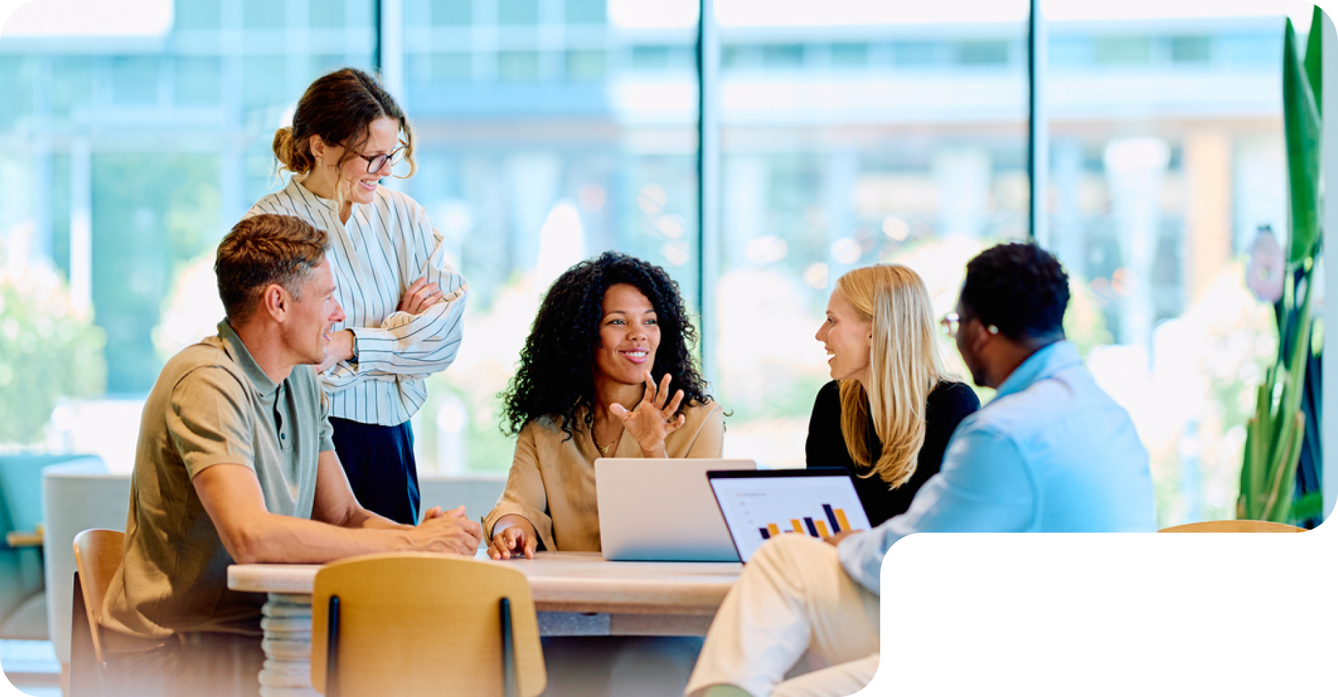 Team collaborating around a meeting table